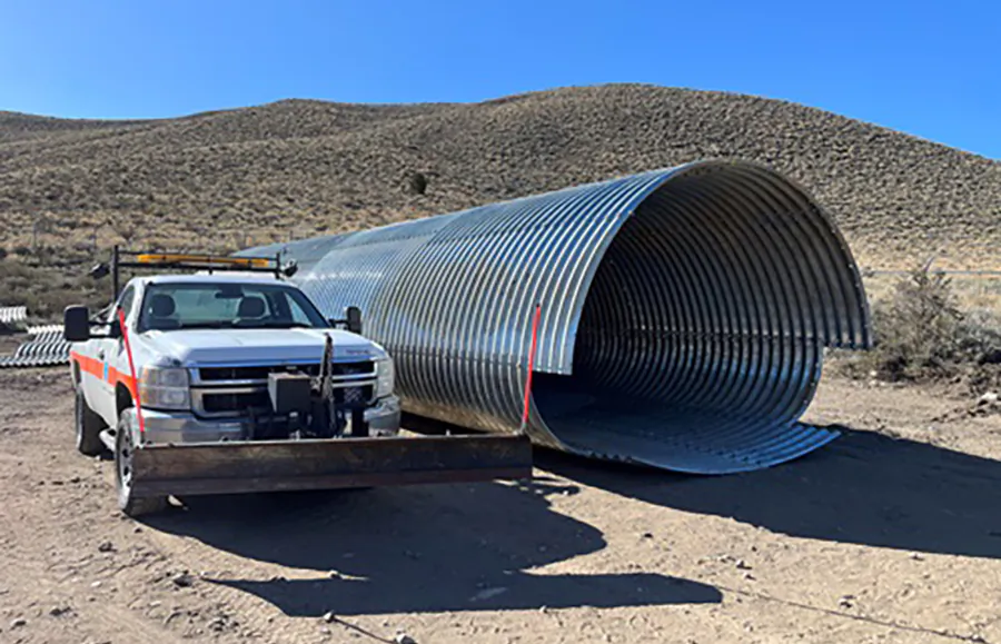 A corrugated steel pipe that will become one of two wildlife crossings beneath Highway 395 as part of the Sonora Junction Shoulders Project. (Caltrans)