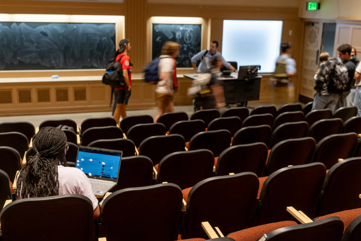 A student sits in a lecture hall while class is being dismissed at the University of Texas at Austin on Feb. 22, 2024. (Brandon Bell/Getty Image)