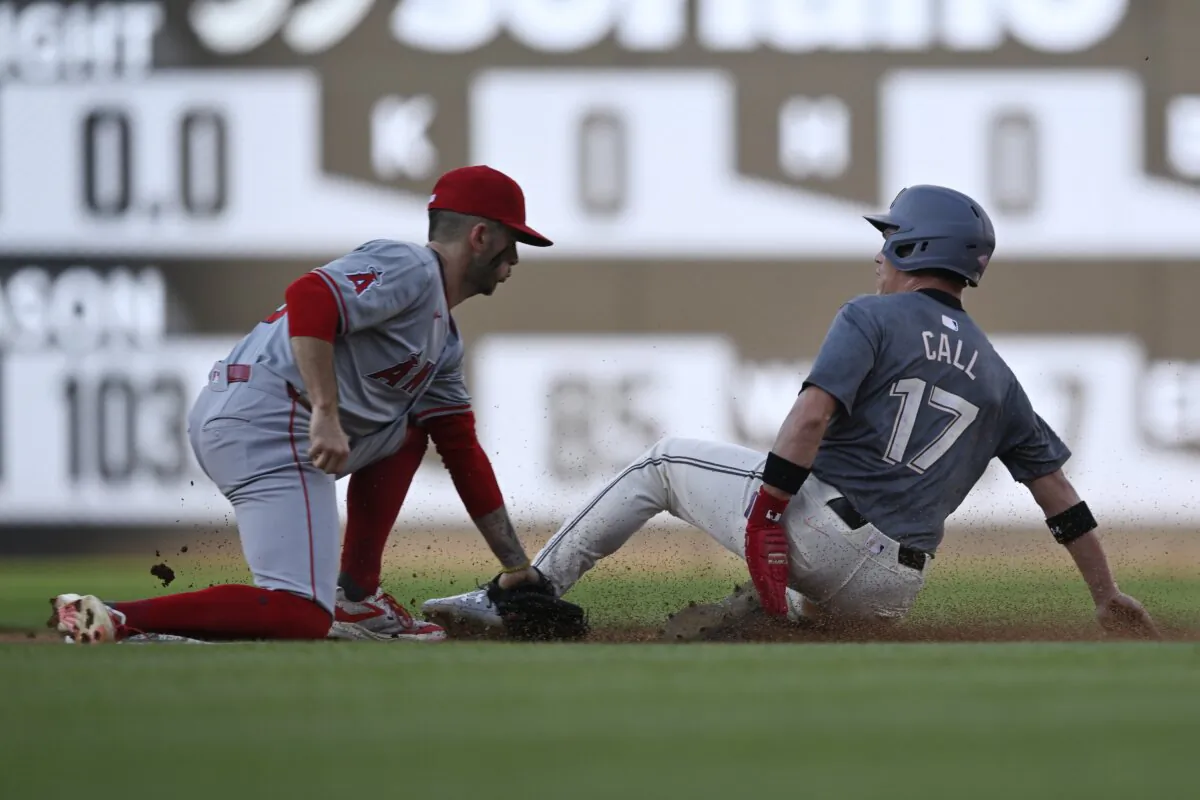Los Angeles Angels shortstop Zach Neto (L) tags out Washington Nationals' Alex Call (R) who was attempting to steal second base during the first inning of a baseball game in Washington on Aug. 9, 2024. (John McDonnell/AP Photo)