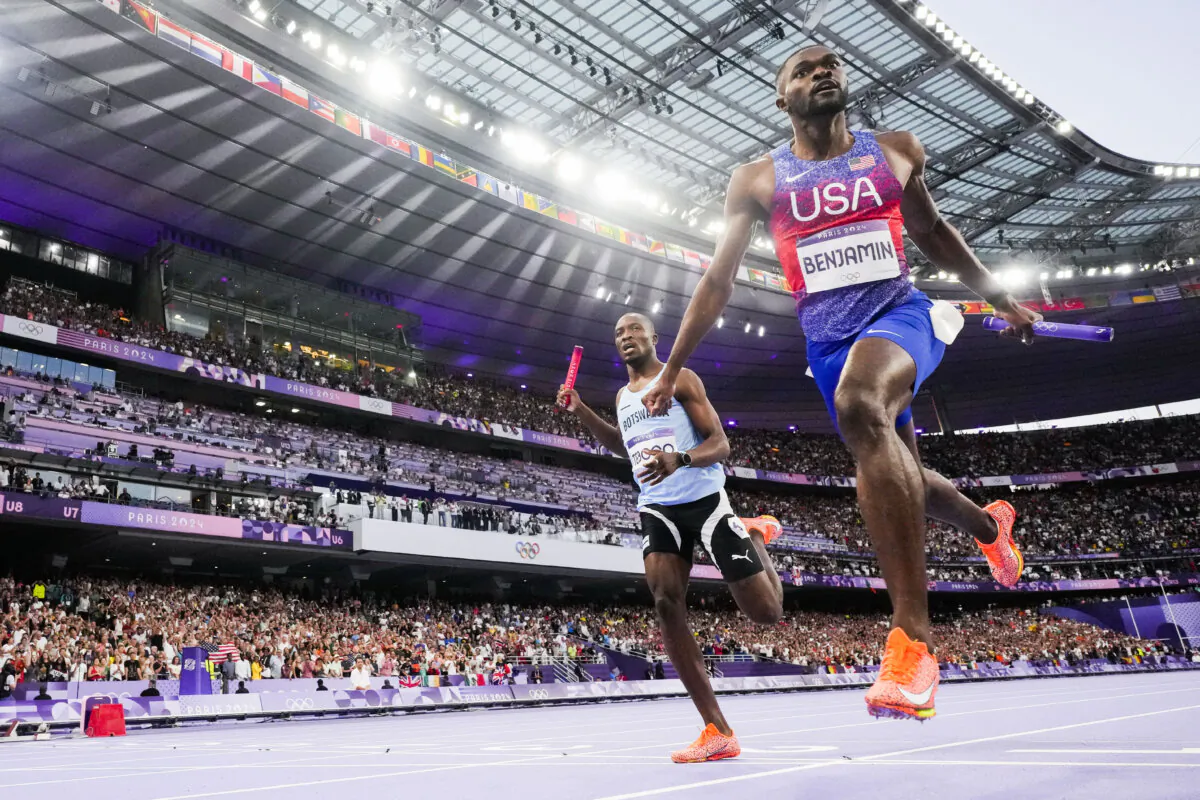 Rai Benjamin of the United States celebrates after winning the men's 4x400-meter relay final at the 2024 Summer Olympics in Saint-Denis, France, on Aug. 10, 2024. (David J. Phillip/AP Photo)