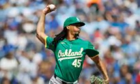 Rooker Hits 29th HR, Bido and 3 Relievers Combine on 2-hitter as Athletics Beat Blue Jays 1–0