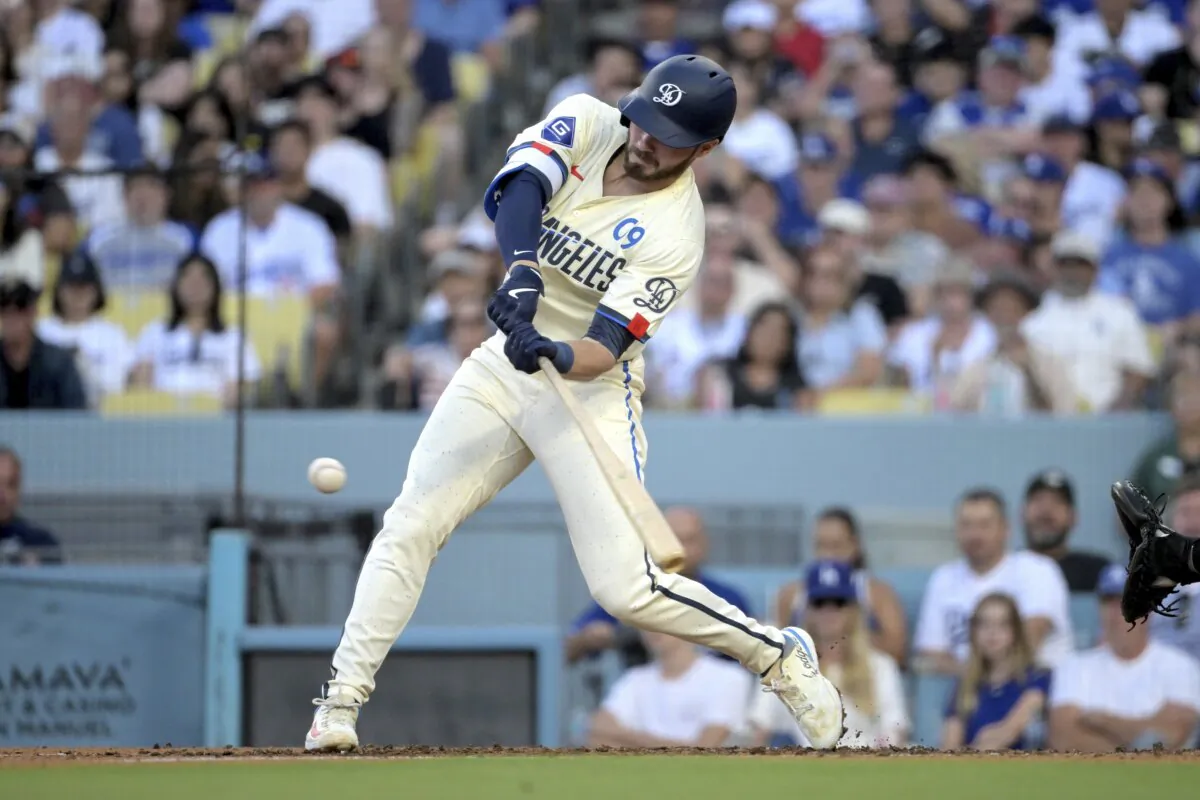Los Angeles Dodgers' Gavin Lux singles in two runs in the third inning against the Pittsburgh Pirates during a baseball game in Los Angeles on Aug. 10, 2024. (Jayne-Kamin-Oncea/AP Photo)