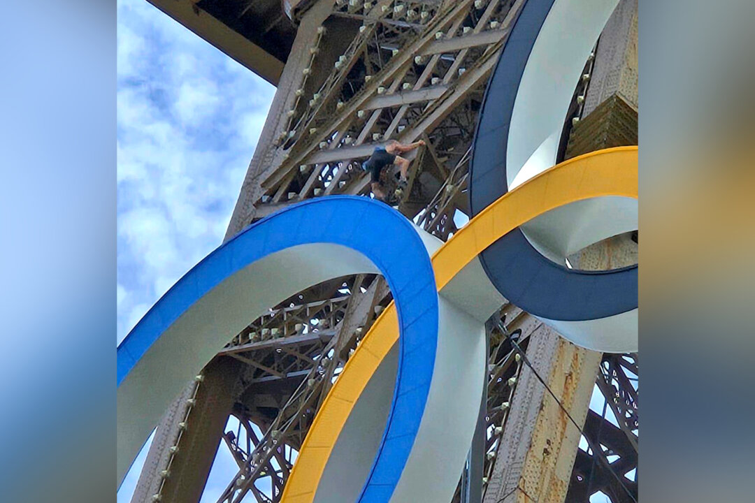 Police Arrest Man Climbing Eiffel Tower, Prompting Evacuation Hours Before Closing Ceremony