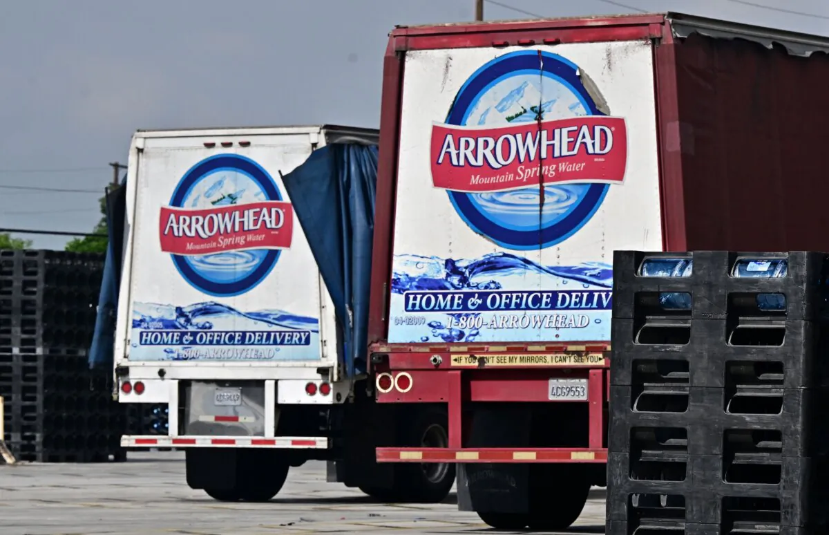A worker loads bottled water for delivery at the Arrowhead Bottled Water Delivery center in Los Angeles on Sept. 20, 2023. (Frederic J. Brown/AFP via Getty Images)