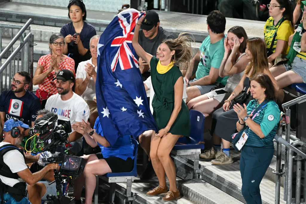 An Australia's fan cheer for her country in the women's semi-final beach volleyball match between Brazil and Australia during the Paris 2024 Olympic Games at the Eiffel Tower Stadium in Paris on Aug. 8, 2024. (CARL DE SOUZA/AFP via Getty Images)