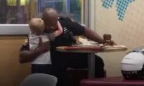 Little Boy Gives Police Officer a Hug