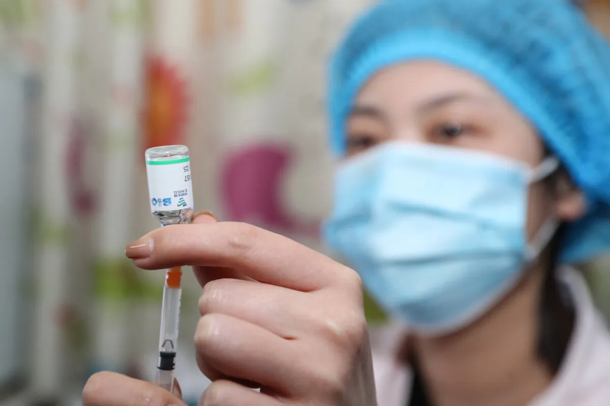 A medical staff preparing to administer a does of COVID-19 vaccine at a hospital in Huaian, in eastern Jiangsu Province, China, on March 21, 2021. (STR/AFP via Getty Images)