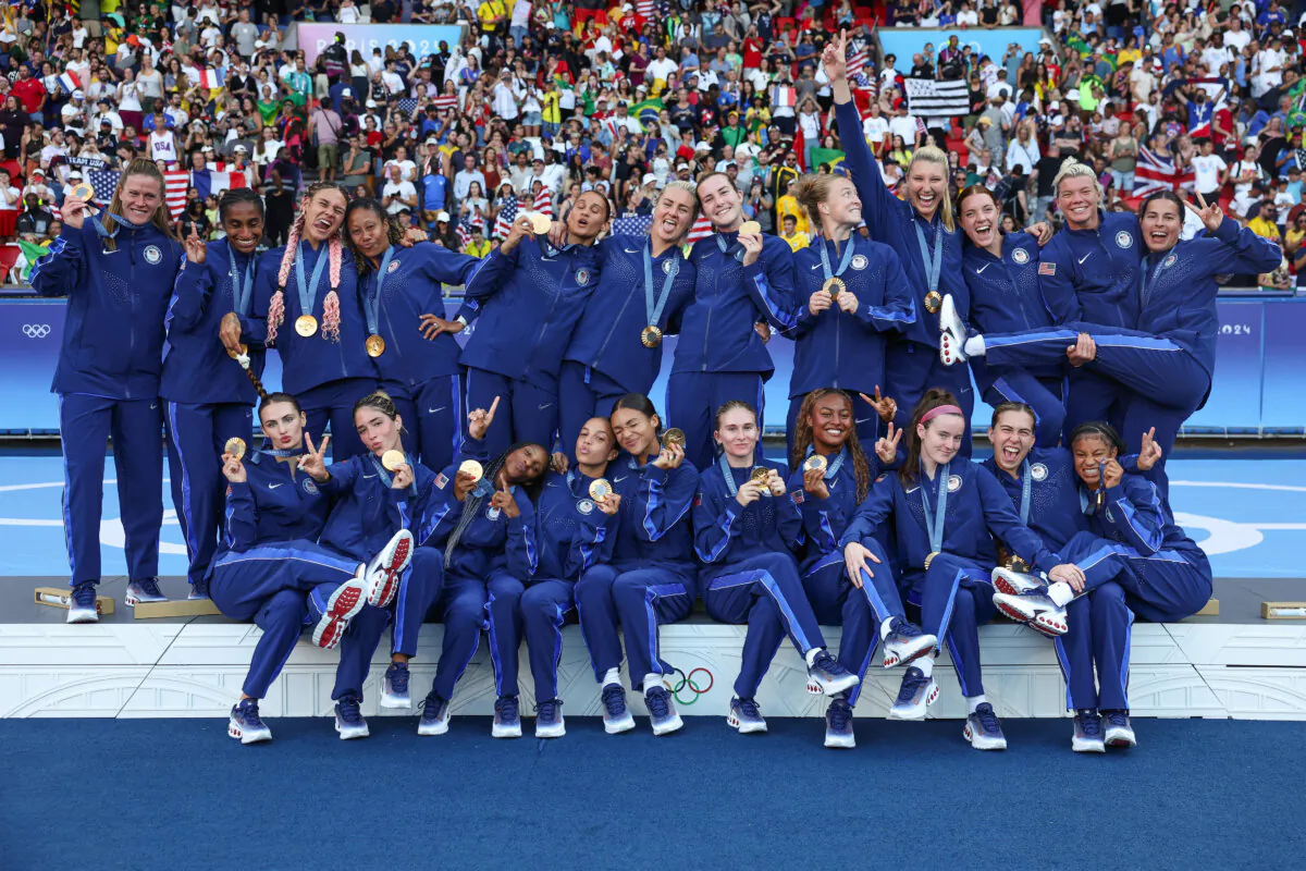 Gold medalists of Team United States pose for a photo after the Women's Football Medal Ceremony during the 2024 Paris Olympics on Aug. 10, 2024. (Carl Recine/Getty Images)