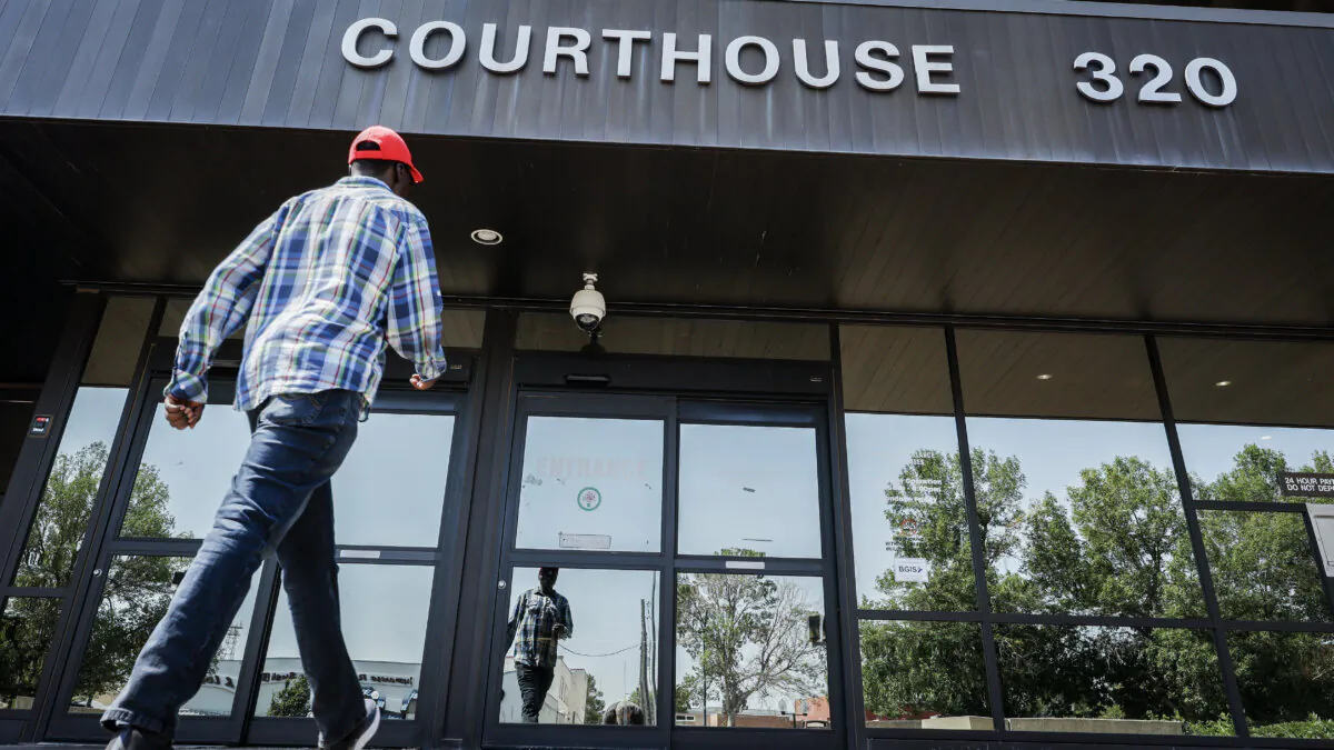 A man enters the courthouse in Lethbridge, Alta., on Aug. 2, 2024. (The Canadian Press/Jeff McIntosh)