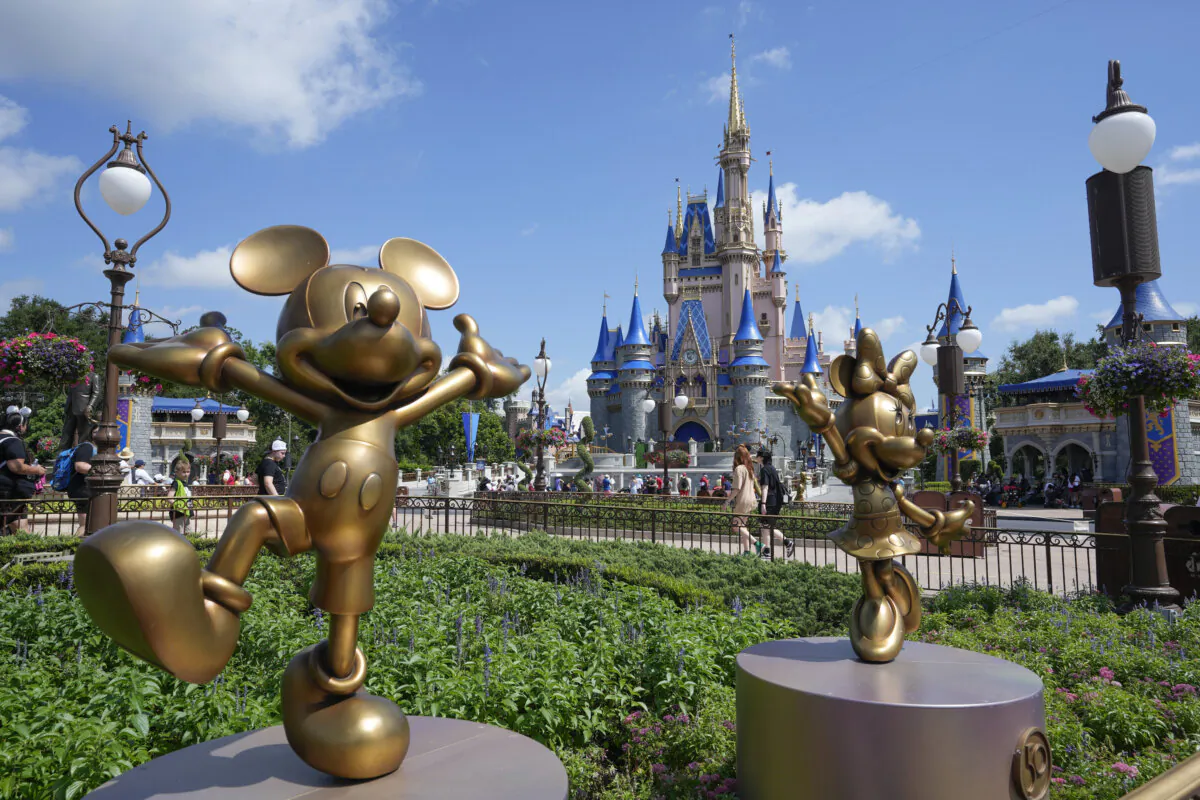The Cinderella Castle is seen at the Magic Kingdom at Walt Disney World in Lake Buena Vista, Fla., on July 14, 2023. (AP Photo/John Raoux, File)