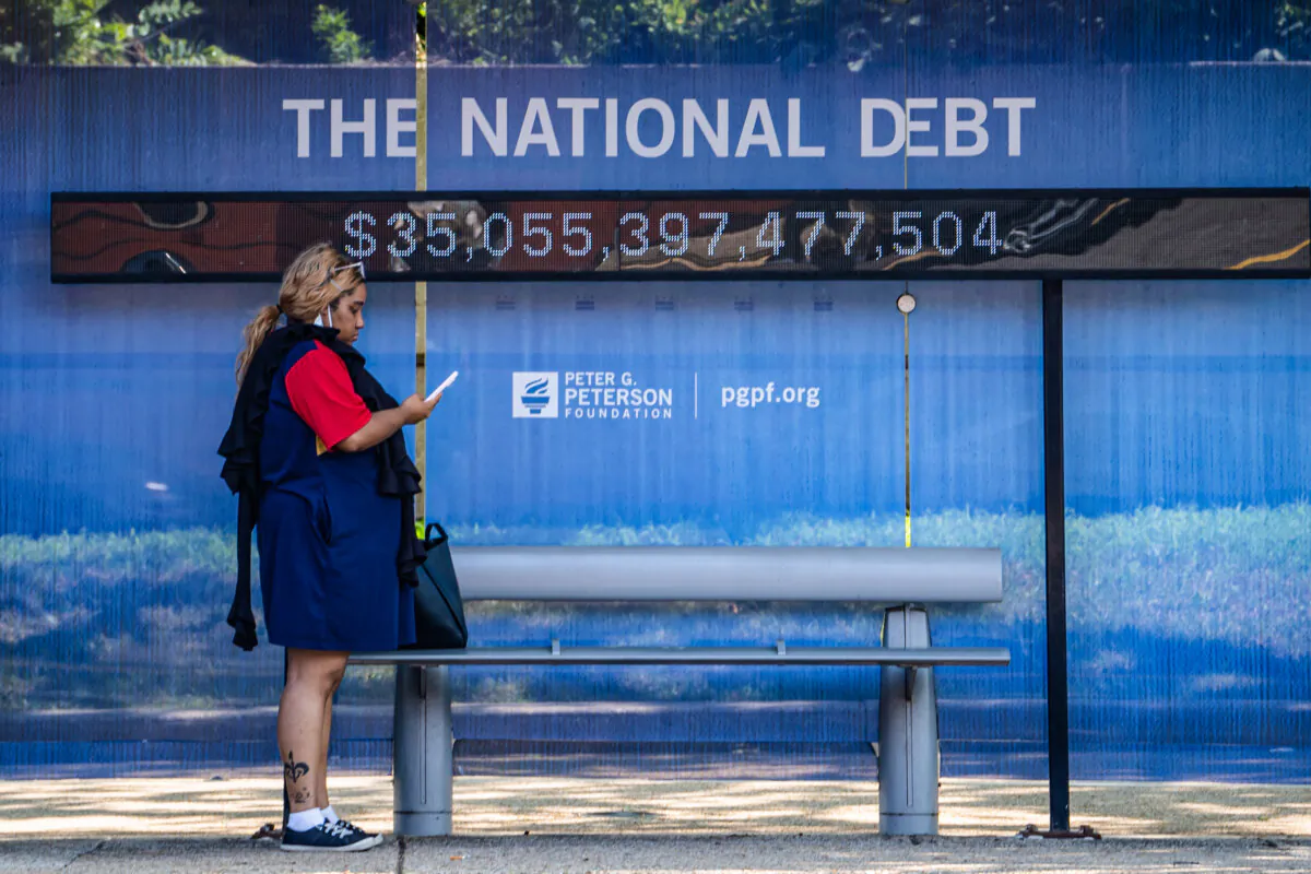 The national debt clock at a bus station in Washington on Aug. 6, 2024. (Madalina Vasiliu/The Epoch Times)