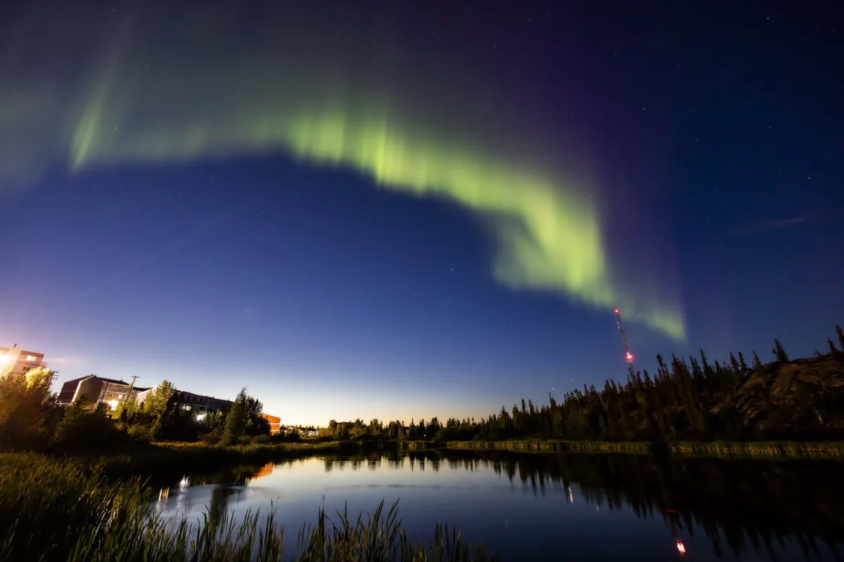 The northern lights, or the aurora borealis, appear in the sky over Rat Lake in Yellowknife, Northwest Territories, Canada, on Aug. 8, 2024. (Bill Braden/The Canadian Press via AP)