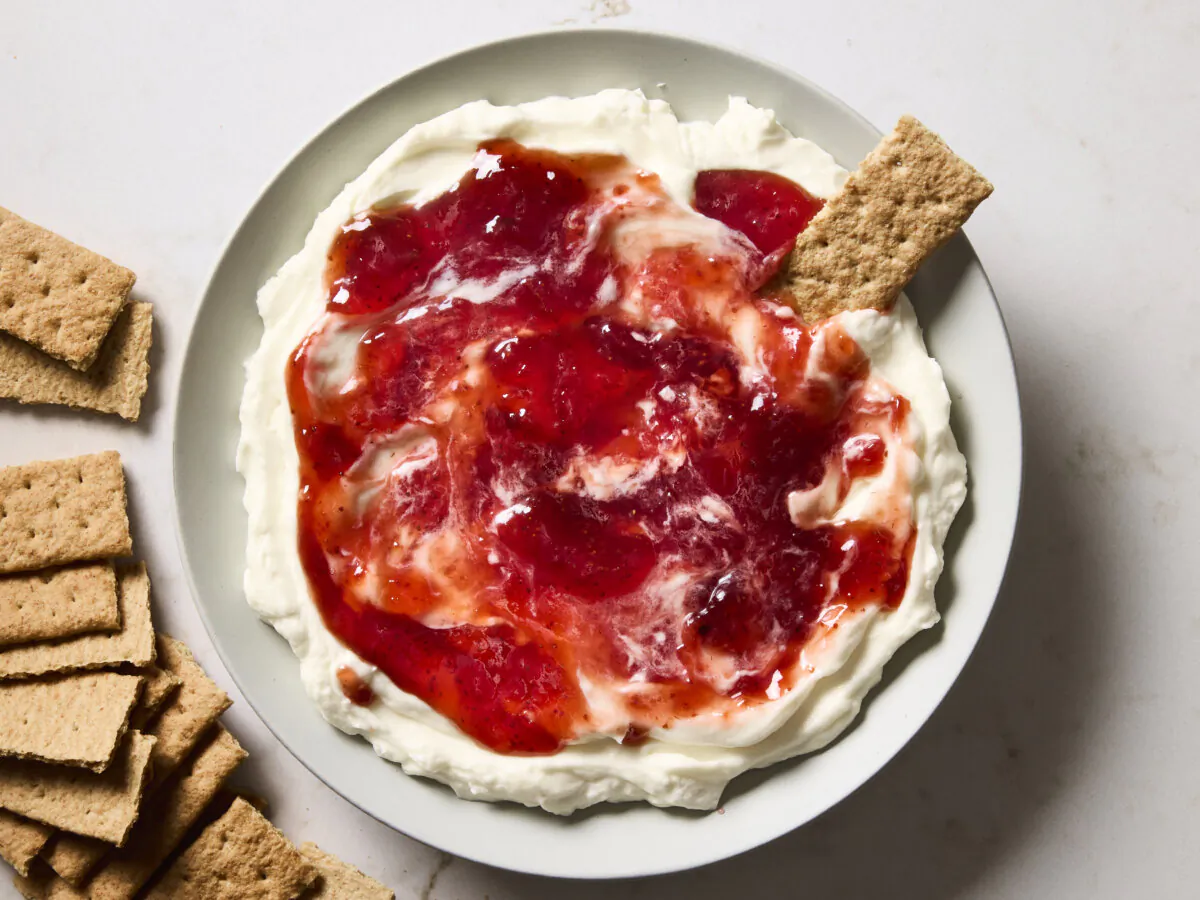 This four-ingredient dip tastes just like strawberry cheesecake. (Erik Bernstein/TNS)