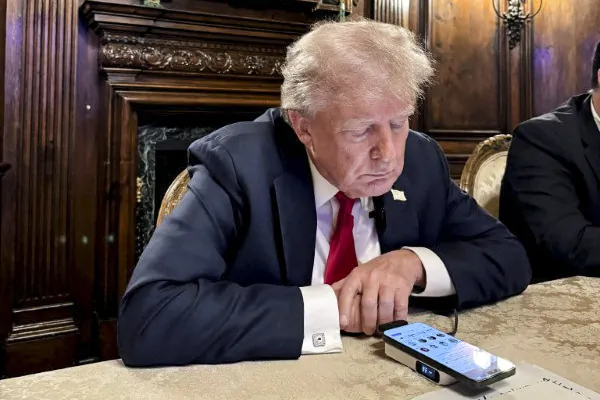 Republican presidential nominee and former U.S. President Donald Trump speaks as he participates in an interview with billionaire entrepreneur Elon Musk on the social media platform X, at Mar-a-Lago in Palm Beach, Fla., on Aug. 12, 2024, in this picture obtained from social media. (Margo Martin via X/via REUTERS)