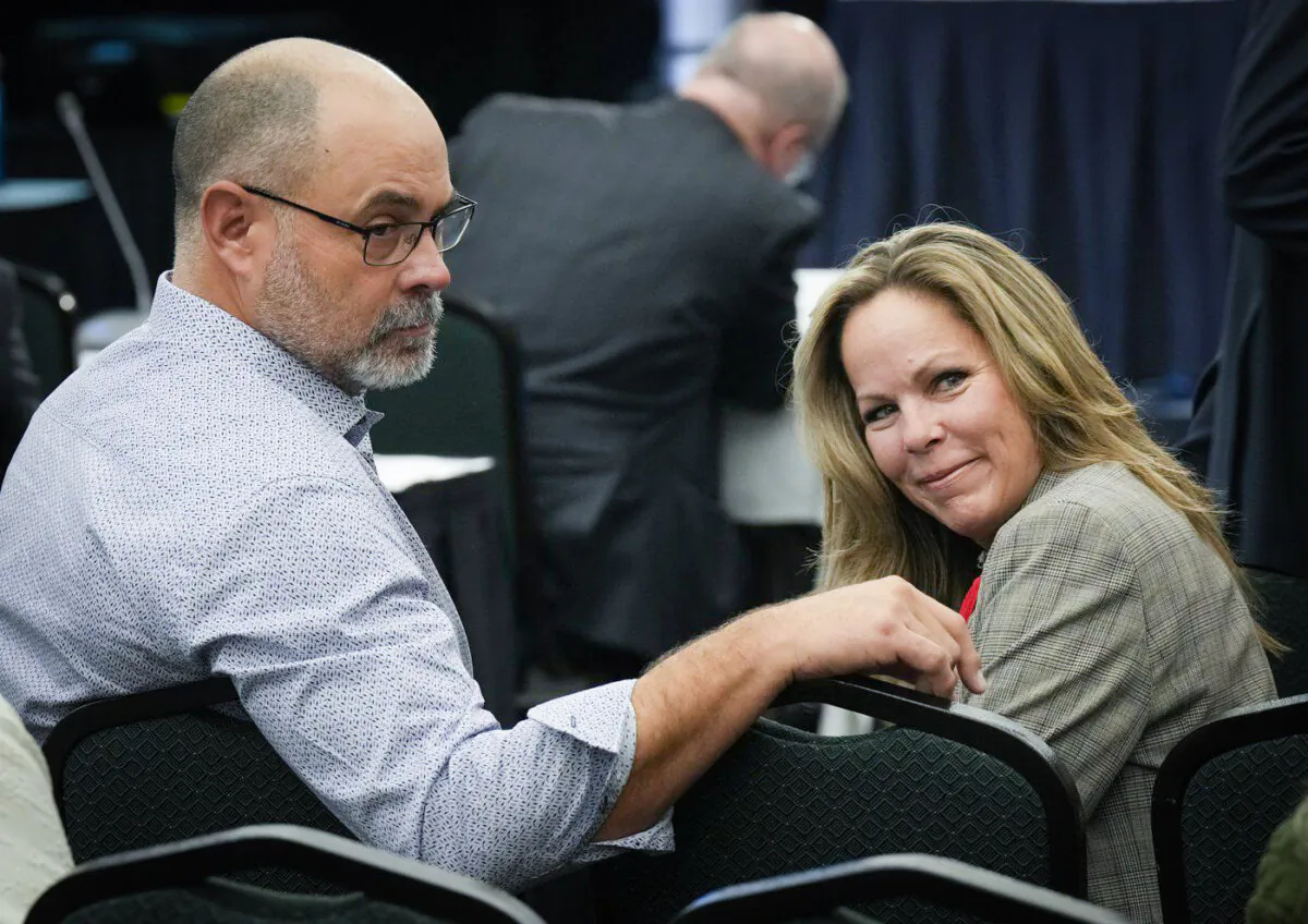 Freedom Convoy organizers Tamara Lich and Chris Barber wait for the Public Order Emergency Commission hearing to begin, in Ottawa on Nov. 1, 2022. (The Canadian Press/Adrian Wyld)