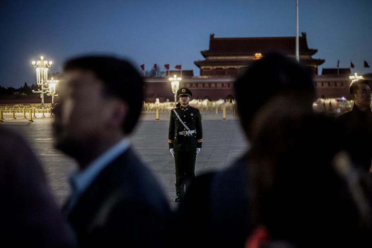 A paramilitary policeman stands ion Tiananmen Square in on March 15, 2019. (Fred Dufour/AFP via Getty Images)