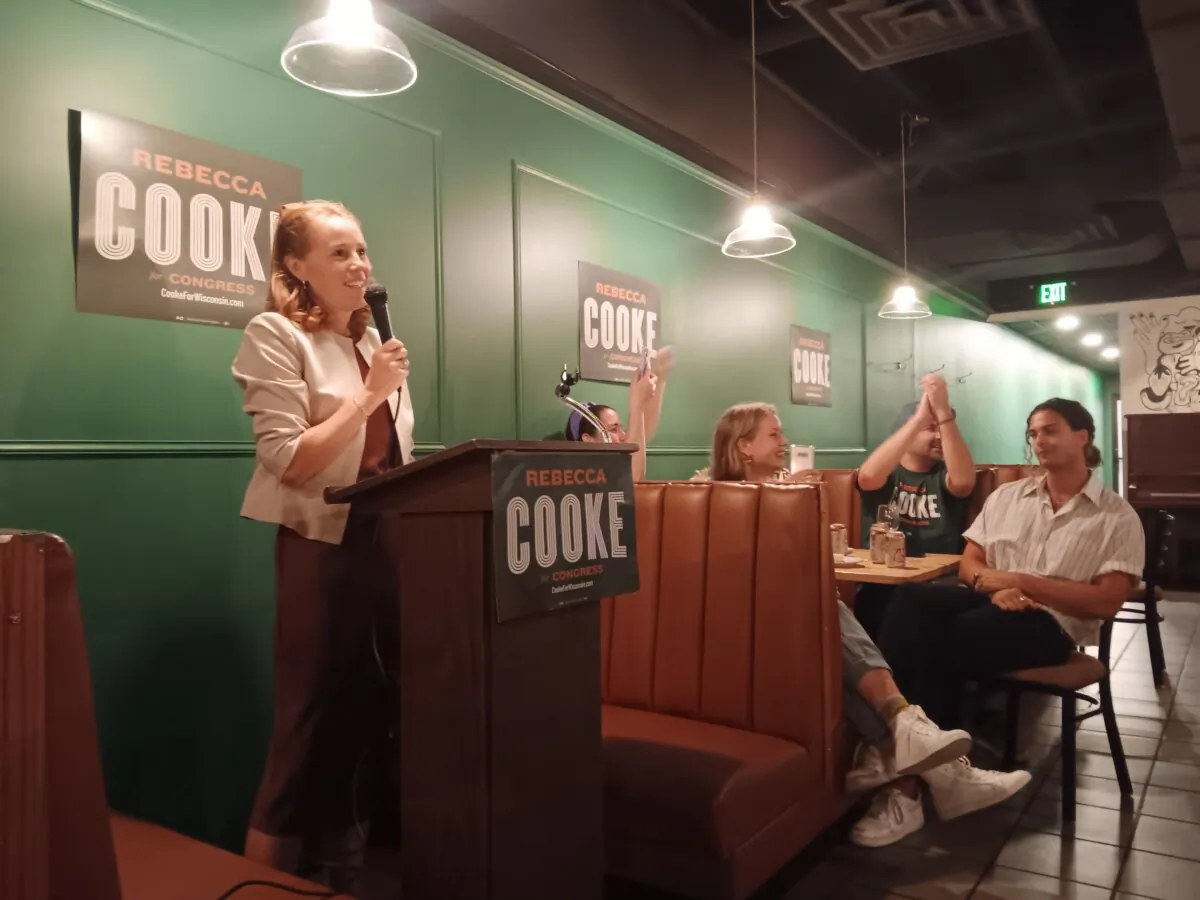 Rebecca Cooke delivers her victory speech after winning the Wisconsin Third District Democratic primary on Aug. 13, 2024. (Nathan Worcester/The Epoch Times)