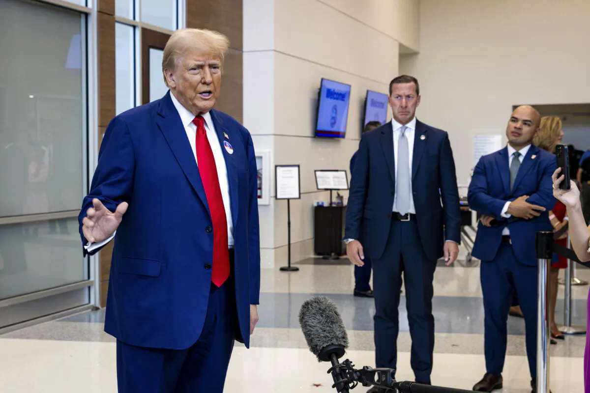 Republican presidential candidate, former President Donald Trump speaks with members of the media after casting his ballot at Palm Beach County Supervisor of Elections in West Palm Beach, Fla., on Aug. 14, 2024. (Eva Marie Uzcategui/Getty Images)