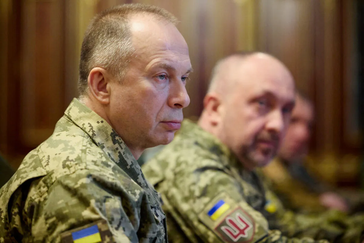 Commander-in-Chief of the Ukrainian Armed Forces Gen. Oleksandr Syrskyi attends a meeting with Ukraine's President Volodymyr Zelenskyy and newly appointed top military commanders in Kyiv, Ukraine, on Feb. 10, 2024. (Ukrainian Presidential Press Service/Handout via Reuters)