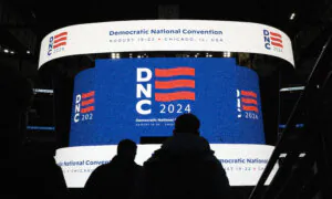 Delegates Arrive at the United Center on Opening Day of DNC