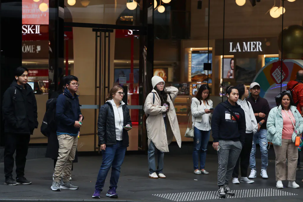 Pedestrians and shoppers move through the central business district (CBD) in Sydney, Australia, on Aug. 6, 2024. (Lisa Maree Williams/Getty Images)