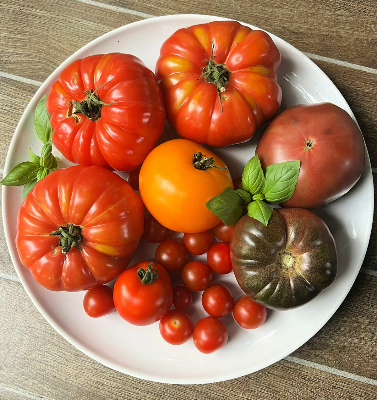 Homegrown tomatoes come in all sizes and colors. (Gretchen McKay/Pittsburgh Post-Gazette/TNS)