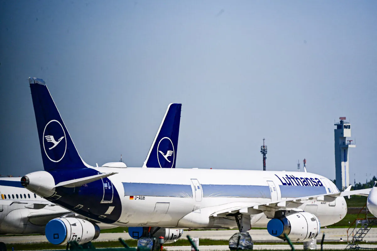 Parked aircrafts operated by German airline Lufthansa are pictured at Berlin Brandenburg BER airport Willy-Brandt in Schoenefeld near Berlin, Germany, on May 31, 2021. (Tobias Schwarz/AFP via Getty Images)