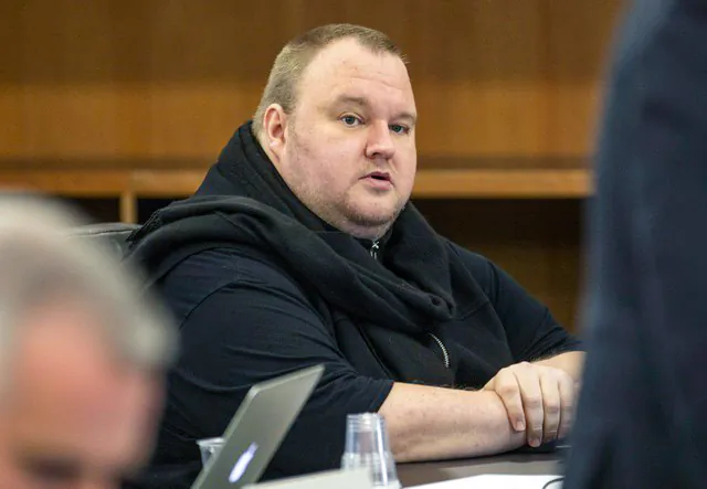 German tech entrepreneur Kim Dotcom sits in a chair during a court hearing in Auckland, New Zealand, on Sept. 24, 2015. (Nigel Marple/Reuters)