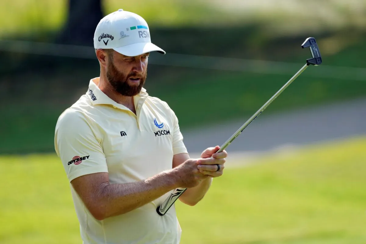 Chris Kirk lines up a putt on the sixth green during the first round of the St. Jude Championship in Memphis, Tenn., on Aug. 15, 2024. (Mark Humphrey/AP Photo)