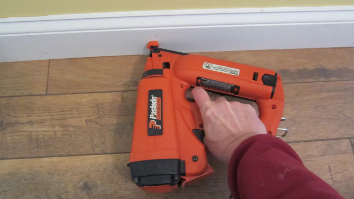 This is a gas-powered finish nail gun. It shoots long nails through wood trim, saving many hours of labor. (Tim Carter/Tribune Content Agency/TNS)