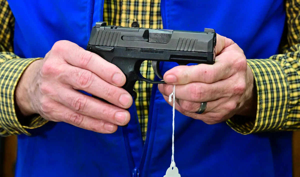 A pistol in Redding, Calif., in a file image. (Frederic J. Brown/AFP Via Getty Images)