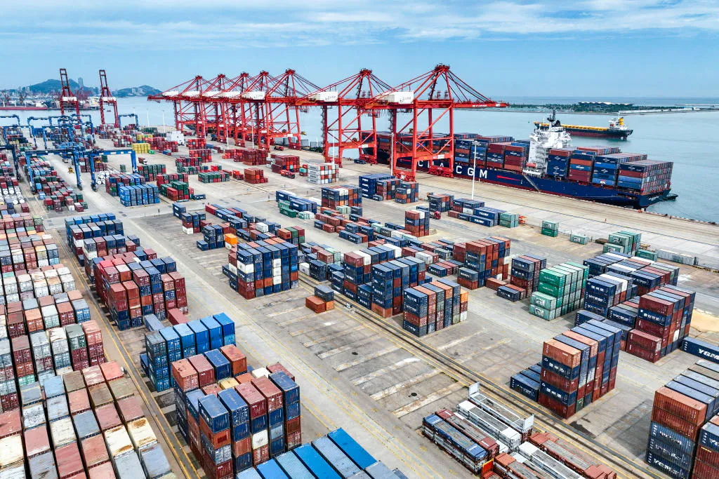 Cranes and shipping containers at the port in Lianyungang, Jiangsu Province, China, on July 16, 2023. (STR/AFP via Getty Images)
