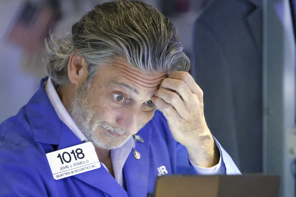 A trader works on the floor of the New York Stock Exchange (NYSE) ahead of the closing bell in New York on Aug. 5, 2024. (Charly Triballeau/AFP via Getty Images)