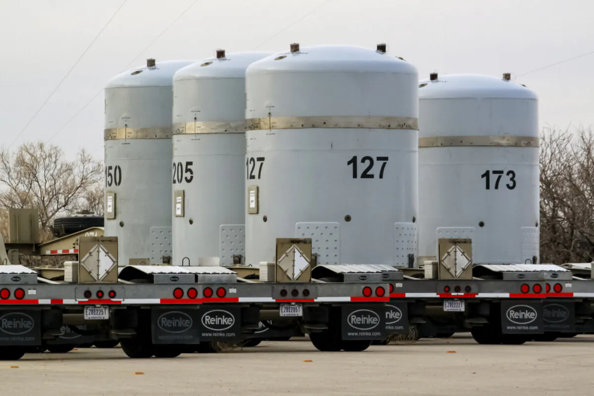 Empty nuclear waste shipping containers sit in front of a waste isolation plant near Carlsbad, N.M., on March 6, 2014. (AP Photo/Susan Montoya Bryan)