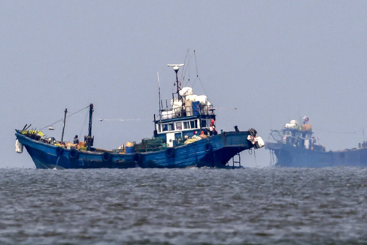 Illegal Chinese fishing boats are seen in neutral waters on June 10, 2016, in Ganghwa Island, South Korea. (South Korean Defense Ministry via Getty Images)