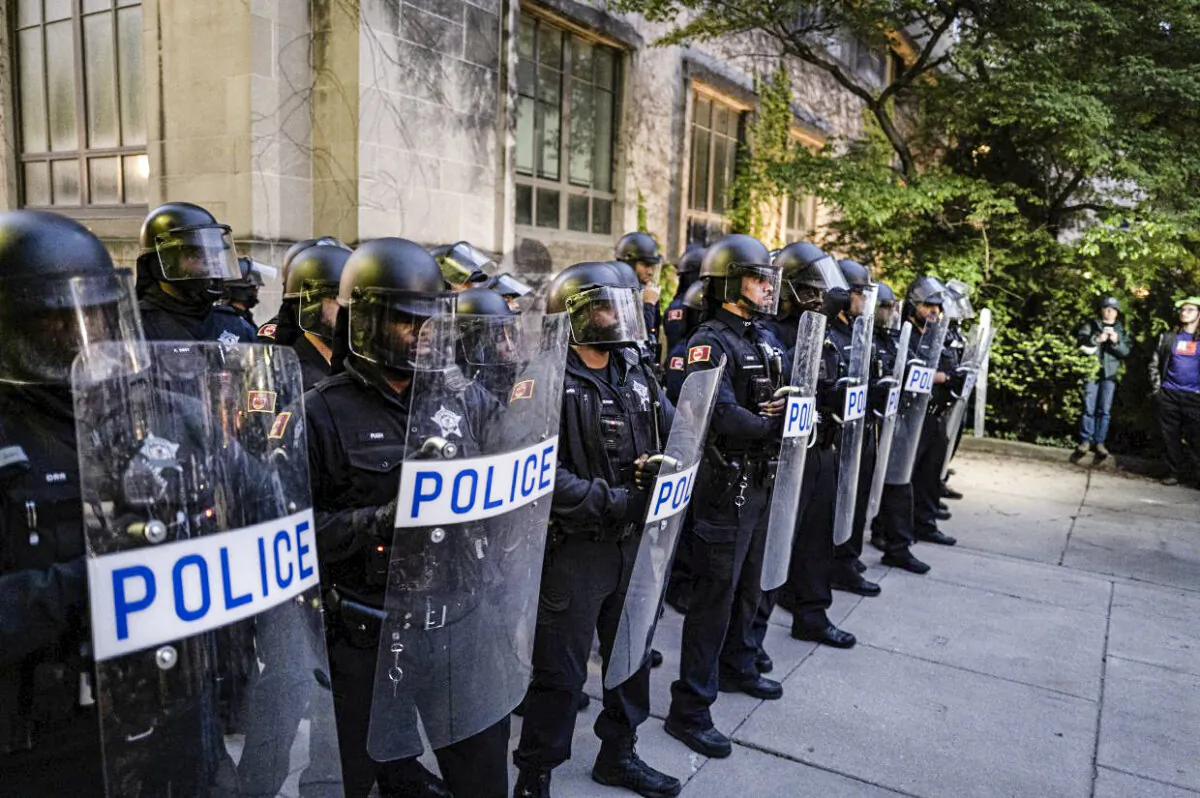 Police block access to the Main Quadrangle on the University of Chicago campus as demonstrators try to enter while police break up a pro-Palestinian encampment in Chicago, Ill., on May 7, 2024.  (Scott Olson/Getty Images)