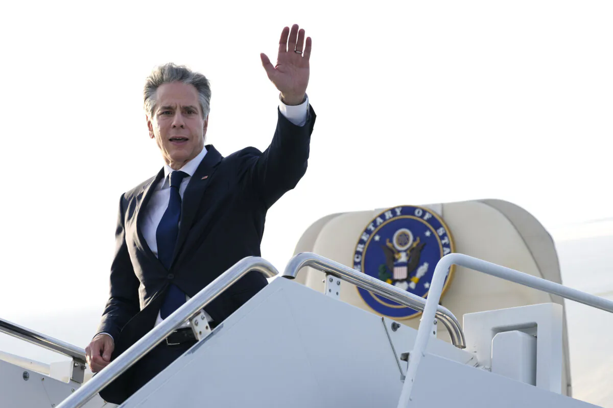 U.S. Secretary of State Antony Blinken waves as he boards a plane to depart Yokota Air Base in Fussa, on the outskirts of Tokyo, Japan, on July 29, 2024. (Shuji Kajiyama/AP Photo)