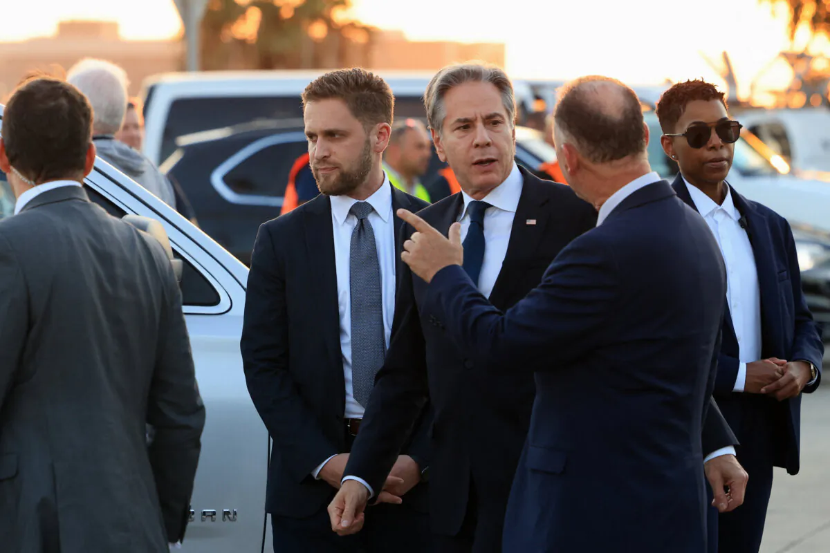 US Secretary of State Antony Blinken (Centre-R) looks on after his arrival in Tel Aviv on August 18, 2024. (Kevin Mohatt/AFP, Pool, via Getty Images)