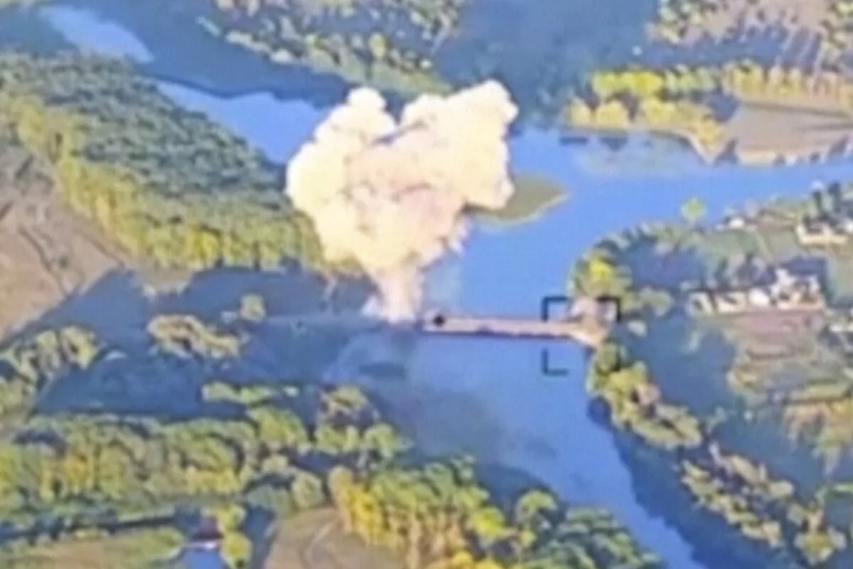 A smoke billows in what is said to show the destruction of a key bridge in Russia's Kursk region on Aug. 18, 2024. (Ukrainian Armed Force via AP)