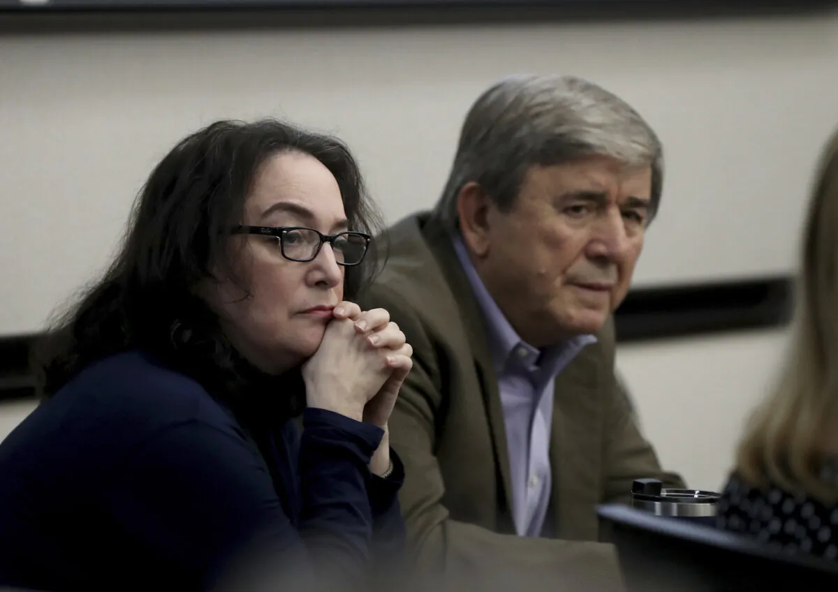 Rose Marie Kosmetatos, left, and her husband, Antonios Pagourtzis, parents of accused Santa Fe High School shooter Dimitrios Pagourtzis, listen to their attorneys discuss a motion, during their civil trial in Galveston County Court No. 3 Judge Jack Ewing's courtroom at the Galveston County Courthouse in Galveston, Texas, on Aug. 16, 2024. (Jennifer Reynolds/The Galveston County Daily News via AP, Pool)