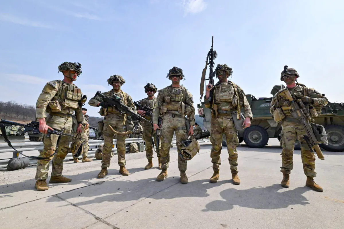 U.S. soldiers from the 2nd Infantry Division Stryker Battalion prepare for a live fire exercise in Pocheon, South Korea, on March 22, 2023. (Jung Yeon-je/AFP via Getty Images)