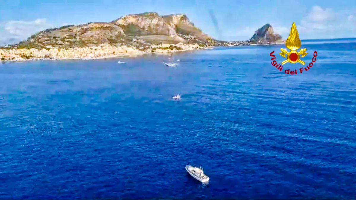 A screengrab from a video released by Italy's fire service, the Vigili Del Fuoco, shows boats searching for survivors of a sailboat accident in the waters near Palermo, Italy, on Aug. 19, 2024. (Vigili del Fuoco via AP, HO)