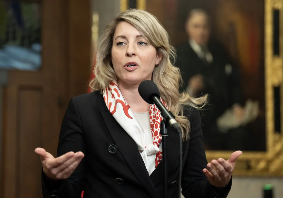 Minister of Foreign Affairs Mélanie Joly speaks with reporters in the foyer of the House of Commons in Ottawa on May 21, 2024. (The Canadian Press/Adrian Wyld)