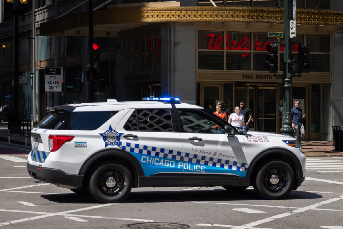 A Chicago Police Department car drives in Chicago, Ill., on Aug 19, 2024. (John Fredricks/The Epoch Times)