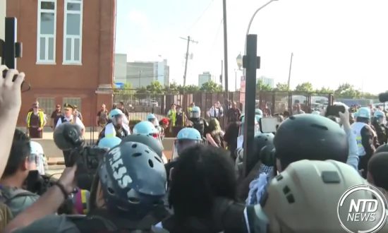 VIDEO: Protesters Breach Security Fence Outside of DNC