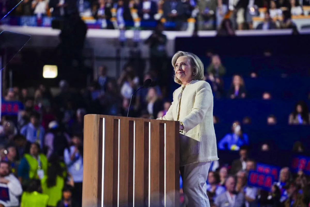 Former U.S. Secretary of State Hillary Clinton speaks at the United Center on the first day of the Democratic National Convention in Chicago on Aug. 19, 2024. (Madalina Vasiliu/The Epoch Times)
