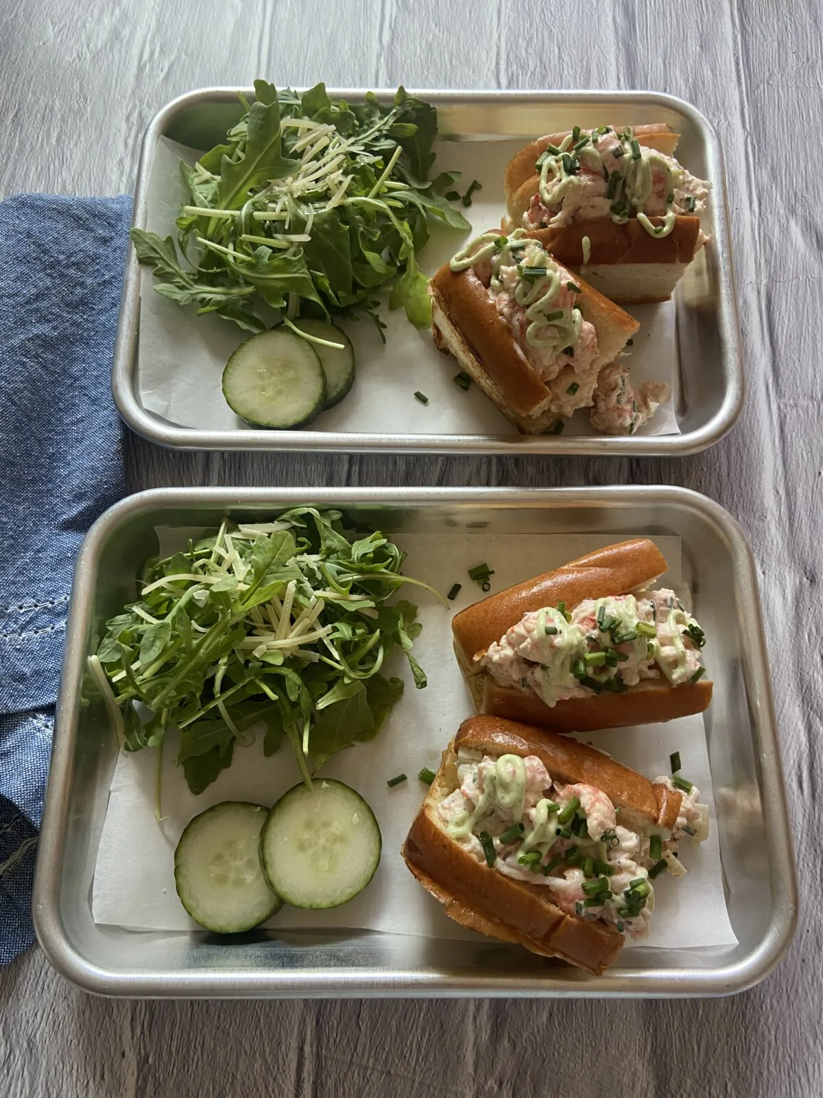 The cilantro crema garnish adds a bit of spice and herb freshness to counteract the rich seafood and buttery roll. (JeanMarie Brownson/TNS)