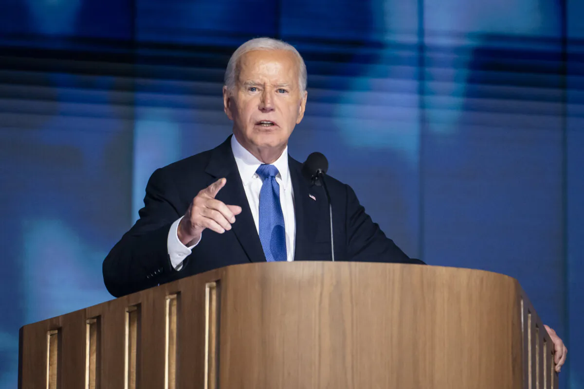 President Joe Biden speaks at the United Center on the first day of the Democratic National Convention in Chicago on Aug. 19, 2024. (Madalina Vasiliu/The Epoch Times)