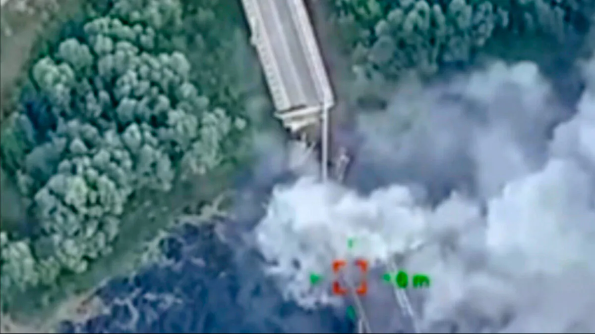 A strategically important bridge over the river Seym is destroyed by Ukrainian troops as they continue their incursion into the Kursk region, Russia, on Aug. 16, 2024. (Ukrainian Defence Ministry Press Office via AP)