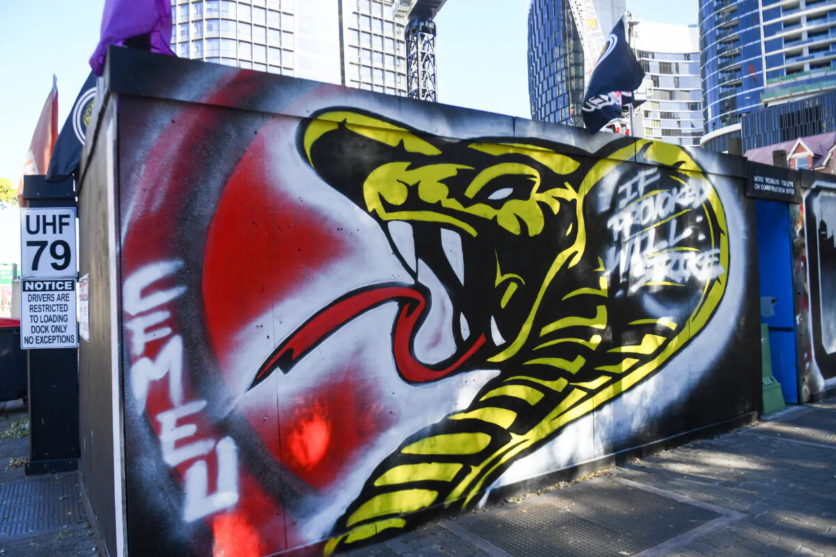 A CFMEU sign is seen in the Brisbane CBD in Queensland, Australia on July 23, 2024. (AAP Image/Jono Searle) 